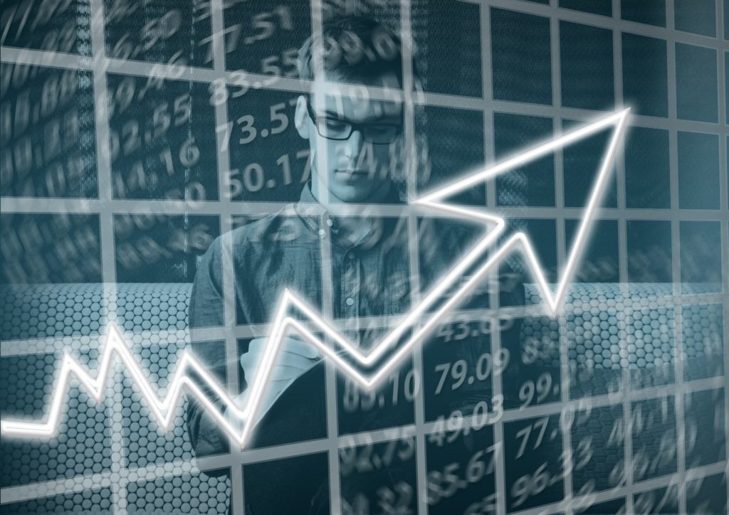 Man looking at growth chart