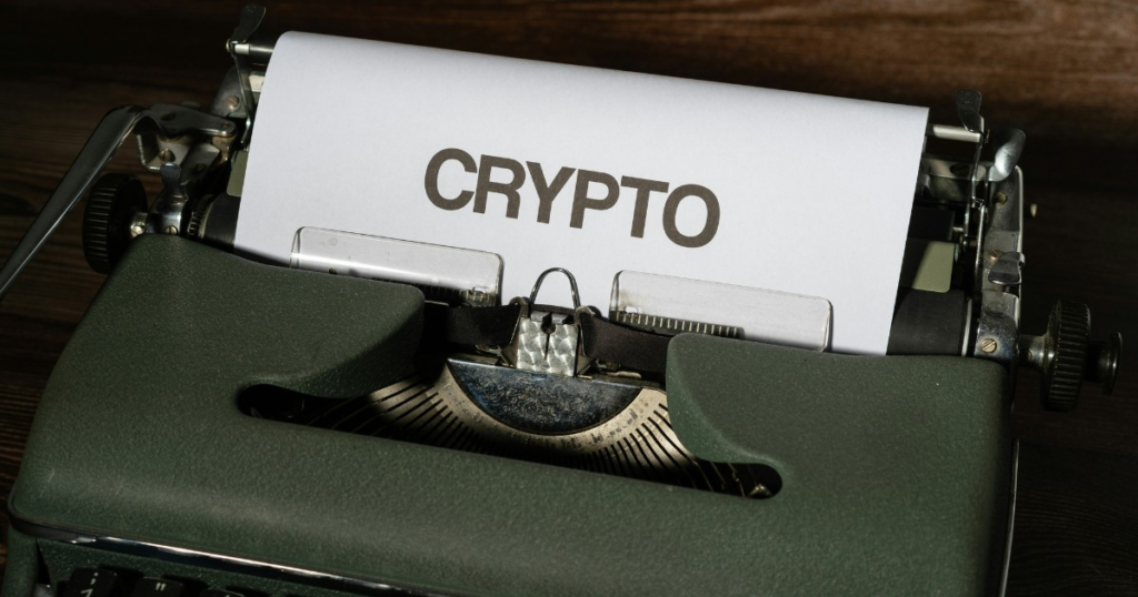 Typewriter with paper saying 'CRYPTO'