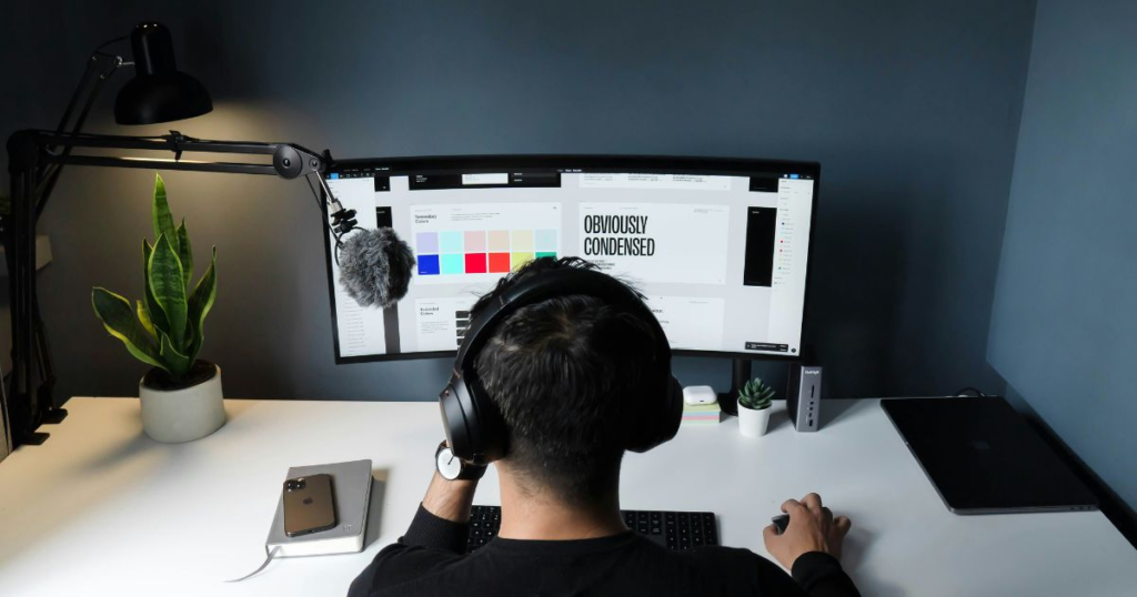 Person working at a computer desk