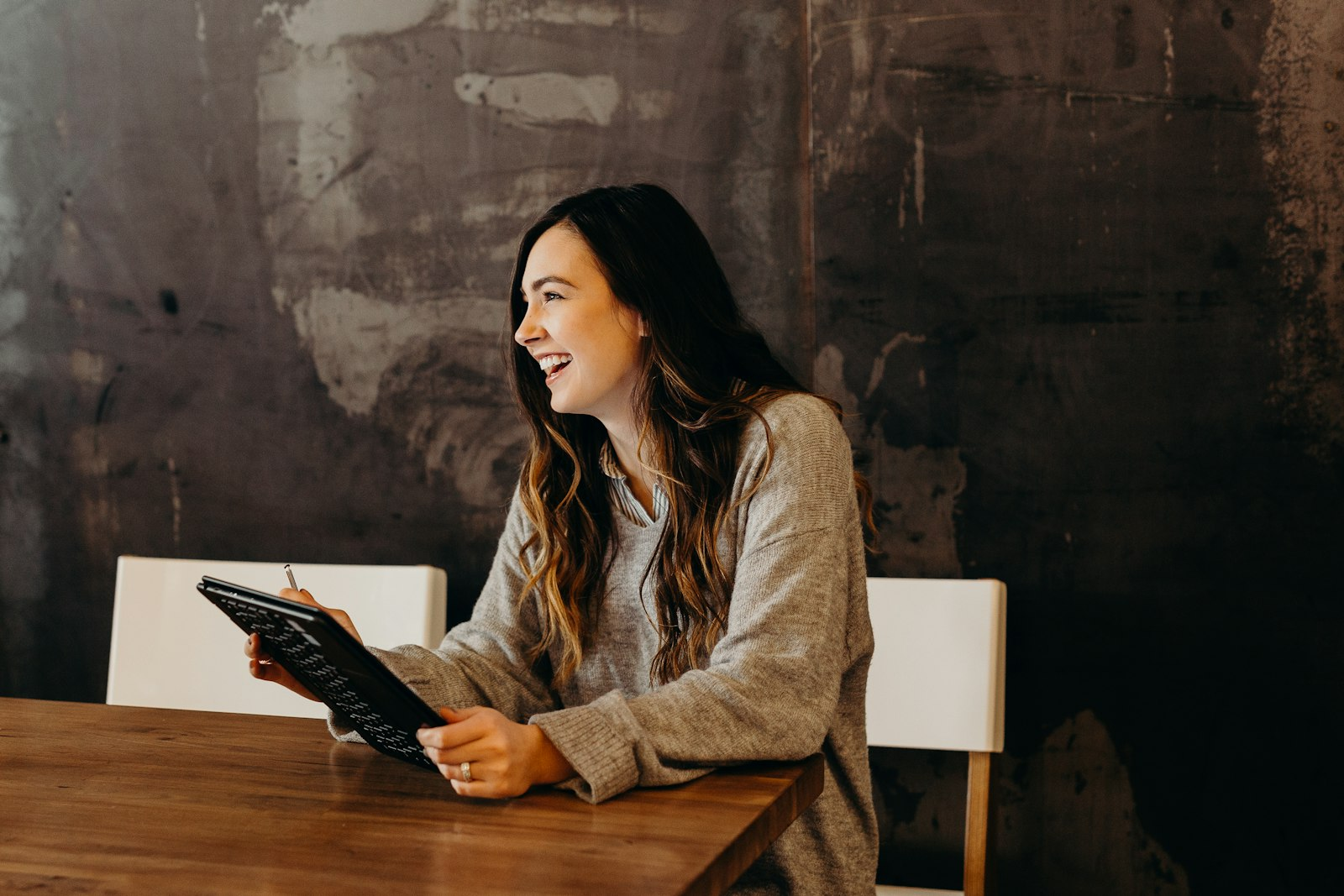 Self-employed professional in Thornhill reviewing work on a tablet